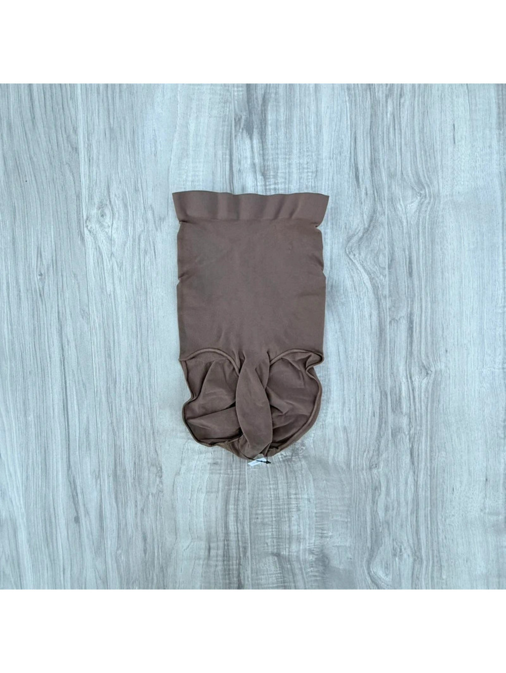 SKIMS Seamless Sculpt High-Waisted Brief in a brown